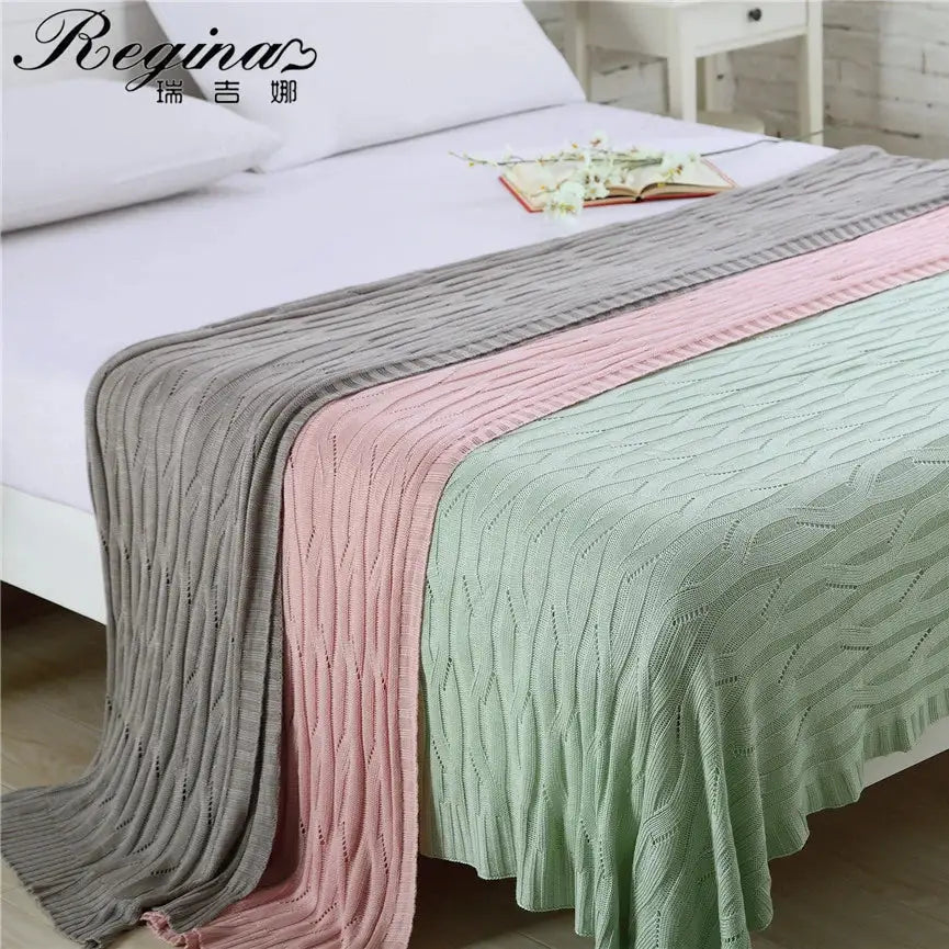 Pastel-colored decorbites bamboo knitted cooling blanket with ribbed texture and soft gray pink and mint green stripes