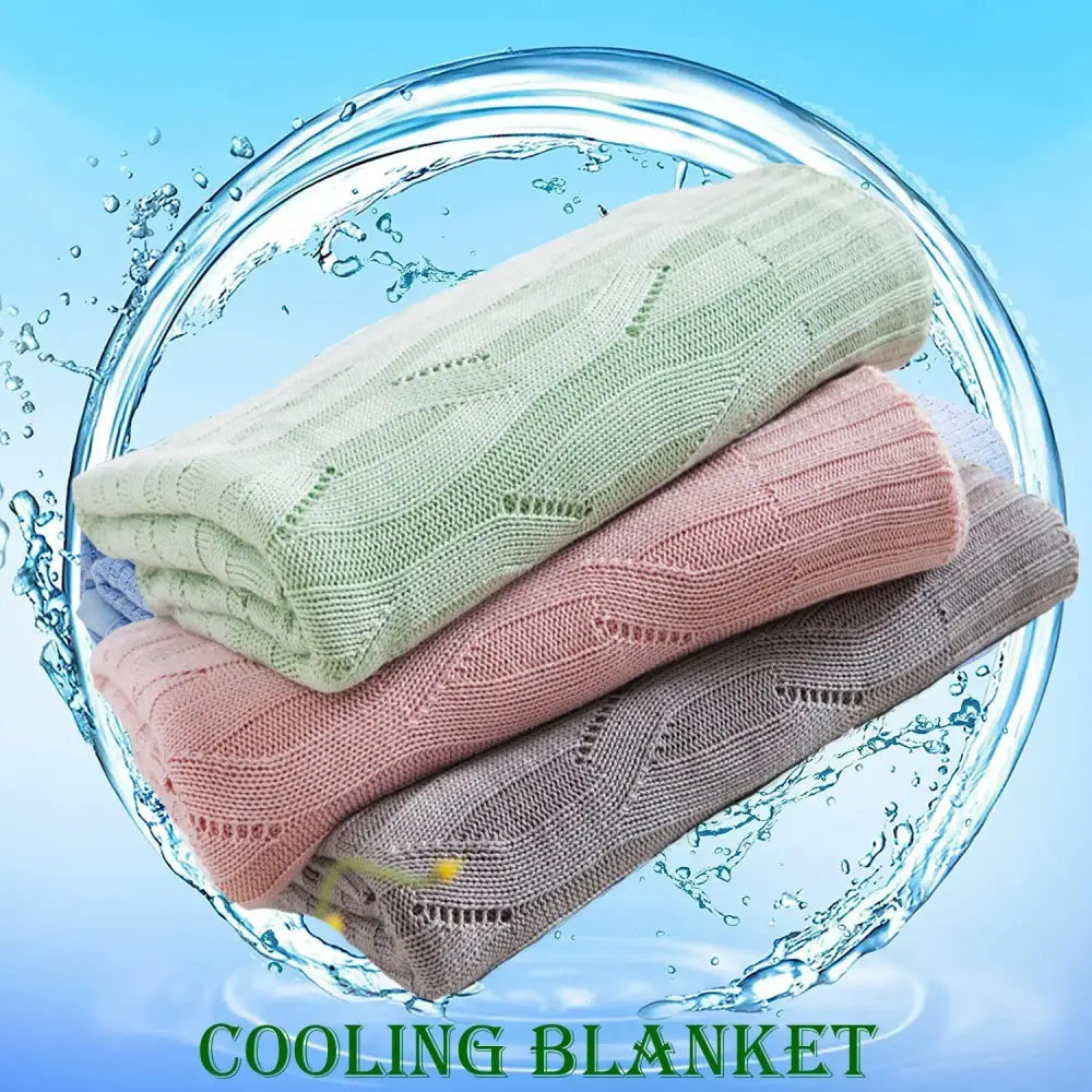 Stacked soft pastel mint blush pink and gray decorbites bamboo knitted cooling blankets with textured ribbed throw design