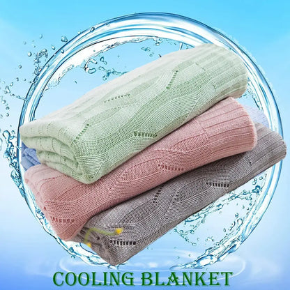 Stacked soft pastel mint blush pink and gray decorbites bamboo knitted cooling blankets with textured ribbed throw design