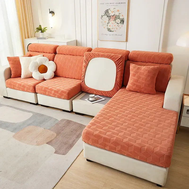 Orangish orange textured decorbites jacquard sofa seat cover with geometric pattern and elasticized edges for living room