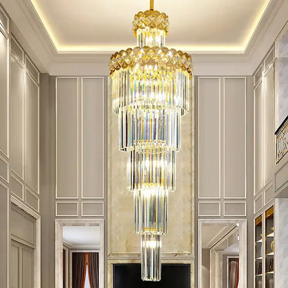 A multi-tiered light luxury crystal chandelier with gold accents and cascading clear glass rods for living room decorbites light luxury