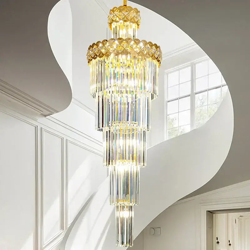Elegant multi-tiered crystal chandelier with gold-toned metal accents and clear prisms for light luxury decorbites living room