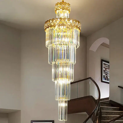 A multi-tiered gold light luxury crystal chandelier with cascading clear glass rods for living room decorbites light luxury