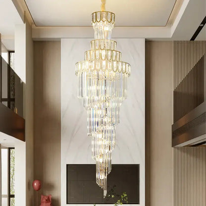 A light luxury rotating crystal chandelier with gold metal accents and clear faceted crystals for villa living room decorbites light luxury
