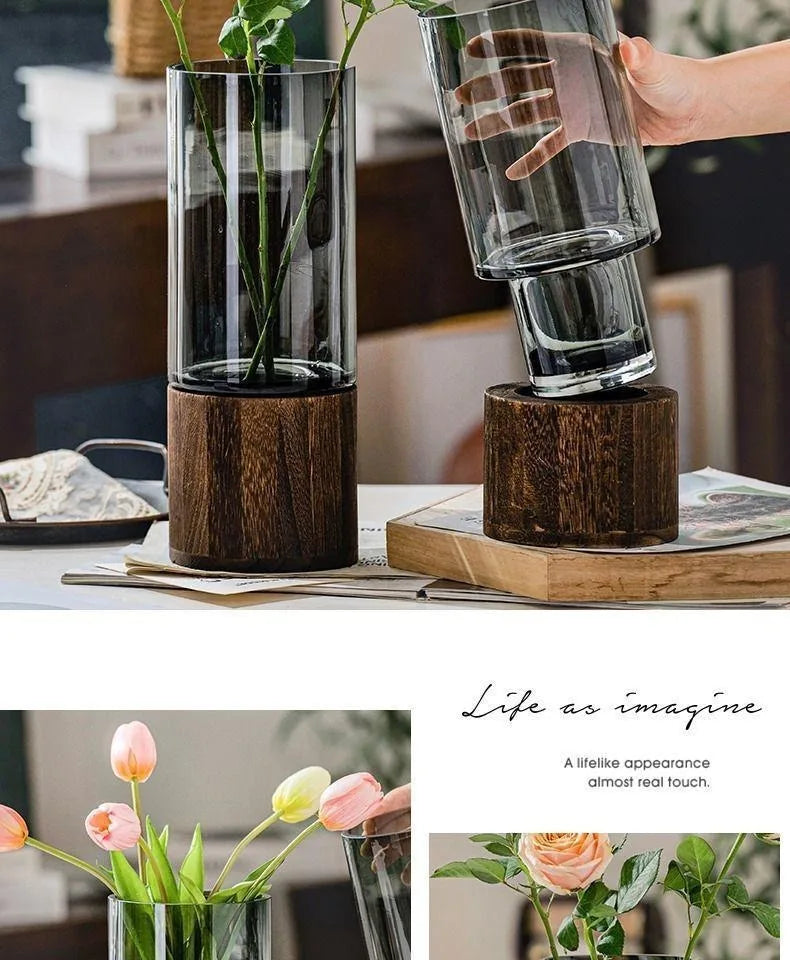 Modern glass vase with clear cylindrical glass and dark wood base for living room table decoration