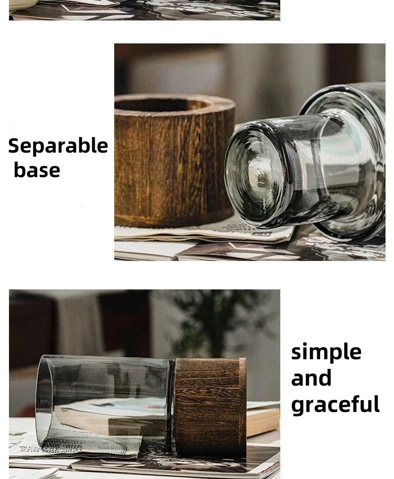 Clear glass tumbler with dark wood base designed as a light luxury simple retro vase for living room decoration