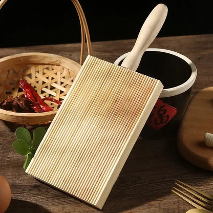 Light wood ridged garganelli board with parallel ridges and handle by decorbites for pasta making