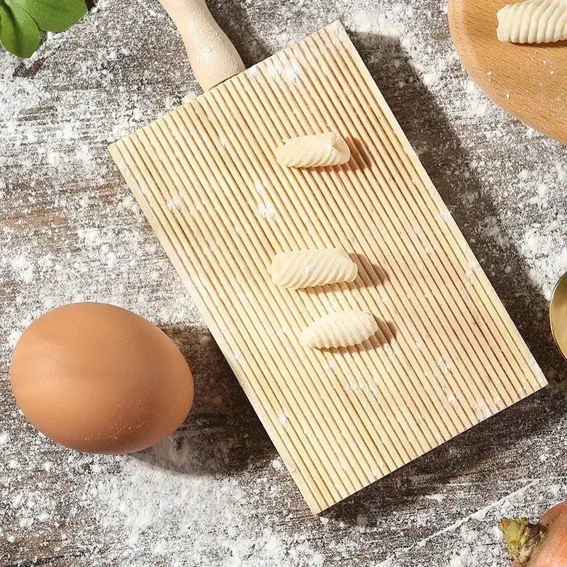 Light wood ridged garganelli board with matching handle by decorbites for making small ridged gnocchi pasta