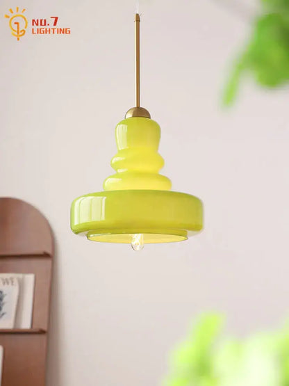 A vibrant lime green glass colorful gourd pendant light with brass hardware for kitchen and dining room pendant lights