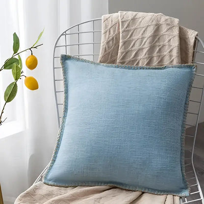Light blue linen fringe cushion cover with textured frayed edge for neutral tones living room decorbites cushion cover