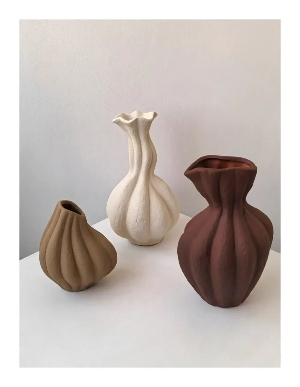 Livetai wabi-sabi handmade ceramic vases in tan off-white and terracotta with sculpted ribbed surfaces for modern boho decor