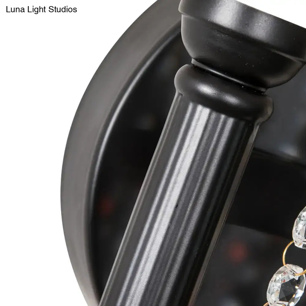 Black matte metal column wall lamp with vertical fluting fabric drum shade and crystal bead detail for bedroom use