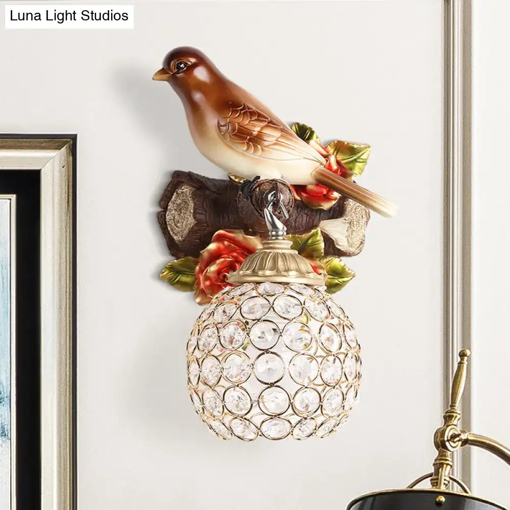 Lodge brown and cream bird wall sconce with red roses ornate brass fixture and crystal global shade for bedroom decor