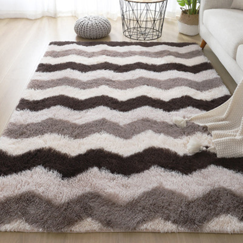 Chevron patterned long hair tie-dyed gradient carpet in brown gray and white stripes with polyester fiber plush texture