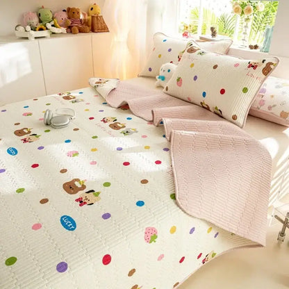 White quilted mattress mat with colorful polka dots cartoon pattern cotton and soft pink textured border decorbites cartoon pattern