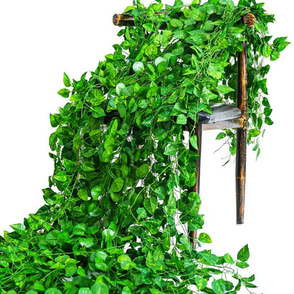 Lush green silk creeper plant cascading over a rustic wooden chair by decorbites for living room decor