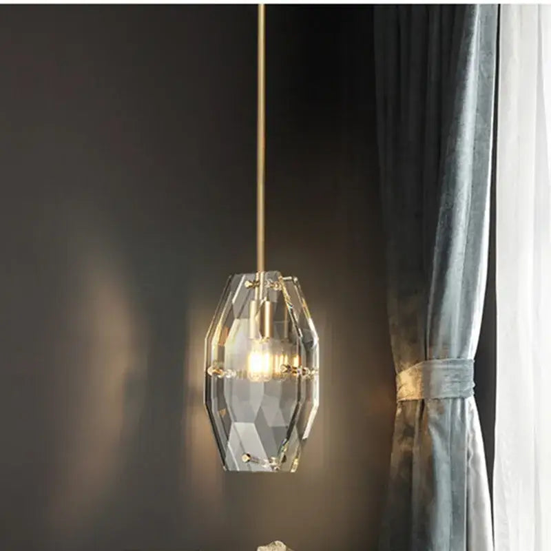 Luxe faceted gold crystal glass pendant lamp with a gold-toned chain for kitchen or bedroom decorbites crystal glass pendant