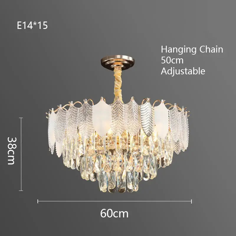 Elegant decorbites crystal indoor chandelier with gold-toned mount, adjustable chain, cascading clear teardrop crystals, and leaf accents