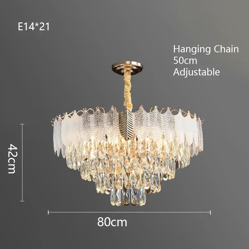 Luxe gold decorbites crystal indoor chandelier with cascading clear teardrop crystals and frosted leaf accents