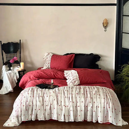 Luxe red and white egyptian cotton lace bedding set with ruffles and delicate floral embroidery for bedroom use