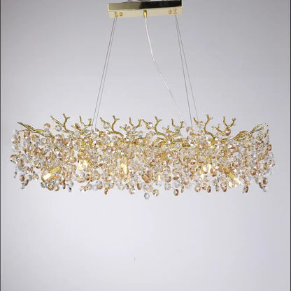 Luxurious gold crystal sunflower branch chandelier with intricate metalwork and cascading clear and amber crystals for dining room decorbites crystal sunflower