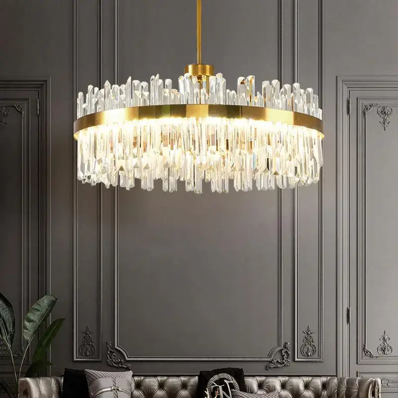 Luxurious gold round crystal pendant light with cascading clear prisms for elegant living room decorbites gold round design