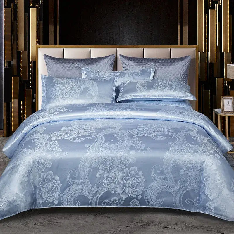Light blue satin bedding set with intricate white floral embroidery from decorbites jacquard satin summer collection