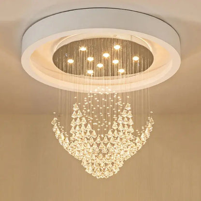 A modern white circular ceiling fixture with cascading clear crystal prisms diamond crystal chandelier for living room lighting