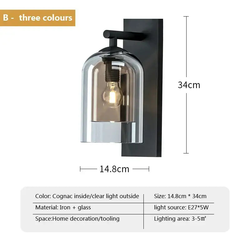 Luxury amber glass wall art light featuring a black iron frame and cognac-tinted clear glass wall art sconce for bedrooms