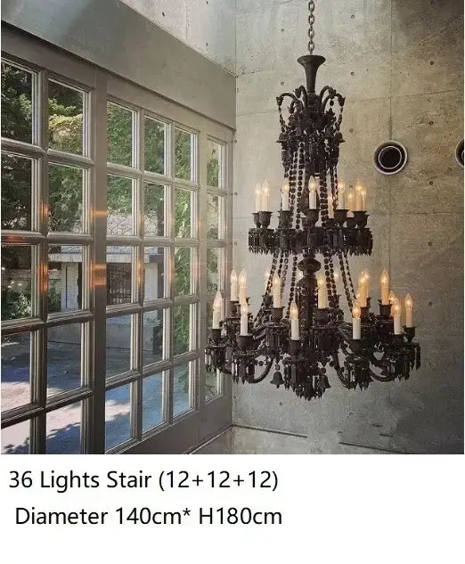 Luxury black crystal chandelier by decorbites featuring 36 candle-style lights and dangling crystal beads for dining room decor