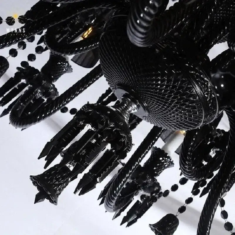 Luxury black crystal chandelier by decorbites featuring intricate glass and metalwork for dining room candle style lighting