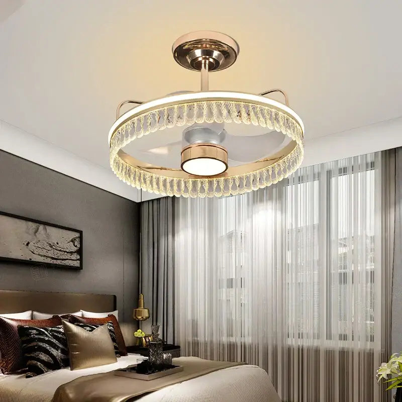 Luxury black and gold ceiling fan chandelier with crystal droplets and warm white LED light for bedroom use