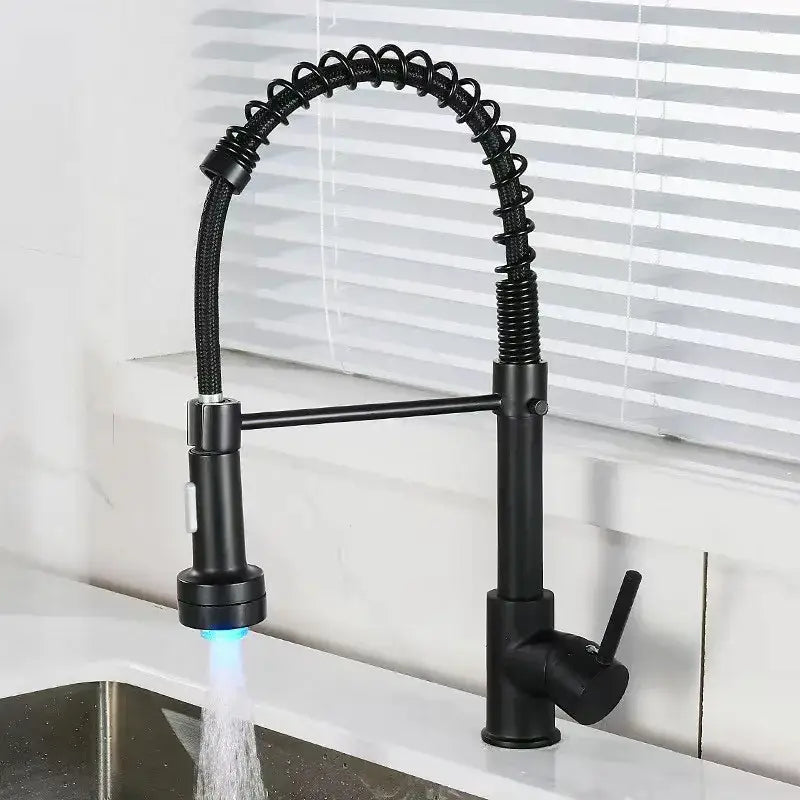 Luxury black and gold kitchen faucet with pull out spring hose and blue light decorbites black kitchen fixture