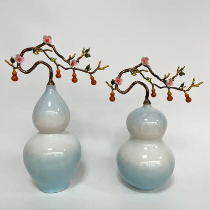 Pair of light blue gradient ceramic gourd vases with golden branches and pink blossoms for home office decoration