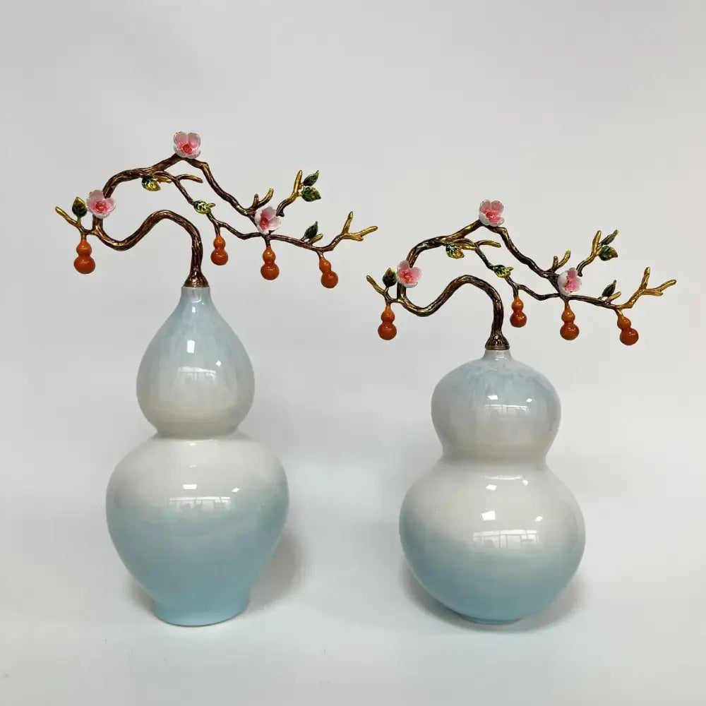 Two elegant light blue ceramic gourd vases with golden branches and pink blossoms perfect for home office decoration
