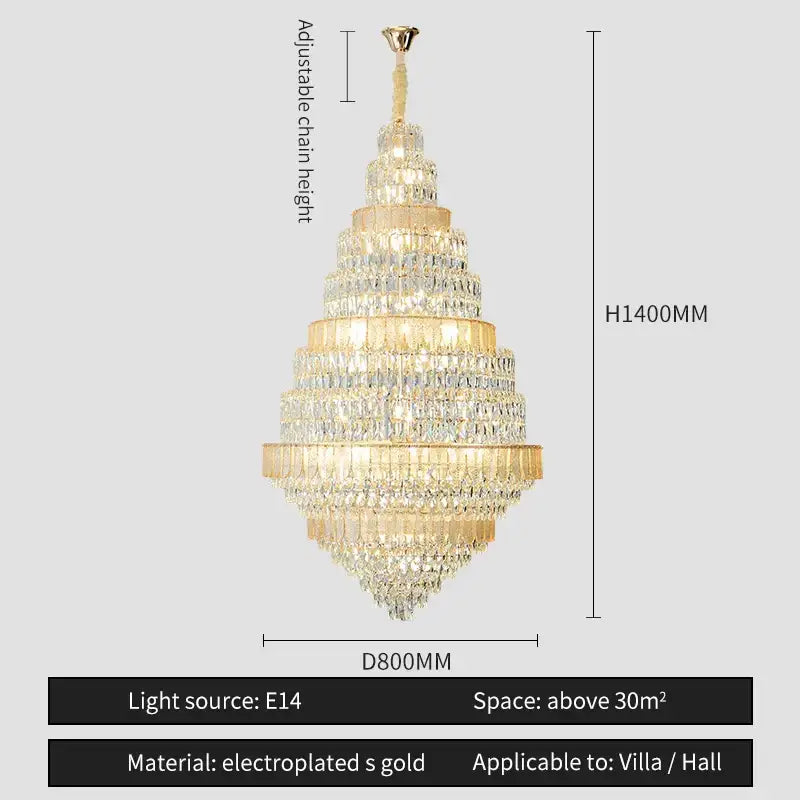 A tiered gold electroplated decorbites crystal headlight chandelier with cascading blue and clear droplets for villa dining room