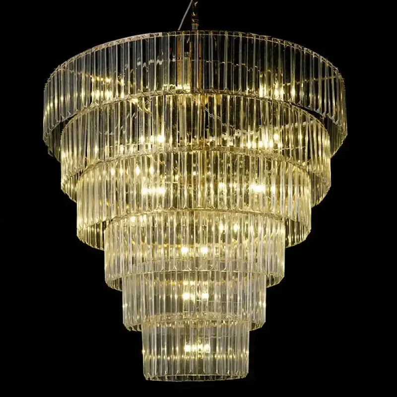Luxury cascading crystal ice bar chandelier with multi-tiered vertical glass rods illuminated by warm golden lights for dining room decorbites crystal ice