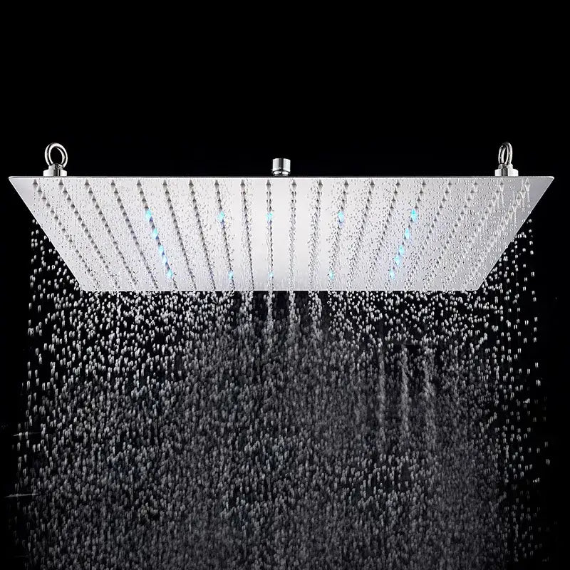 Luxury chrome square shower head in brushed stainless steel with multiple nozzles and integrated blue led lighting