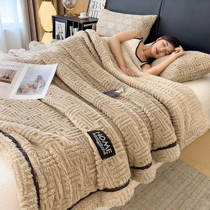 Beige luxury coral fleece throw blanket with textured woven pattern and dark brown trim for coral fleece winter use