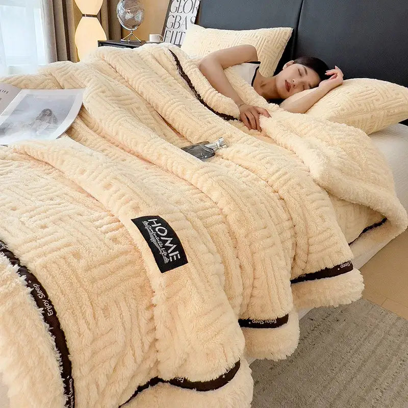 Cream-colored luxury coral fleece plush comforter set with textured woven pattern and dark brown trim for winter bedrooms