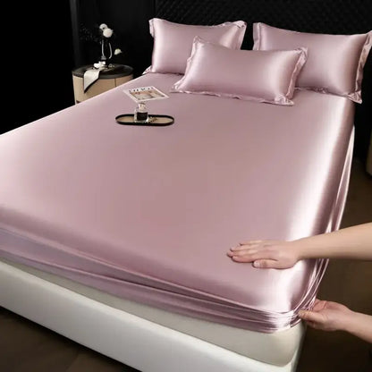 Luxury cream mulberry silk fitted sheet set in soft satin lavender with matching pillowcases for elegant bedroom linen