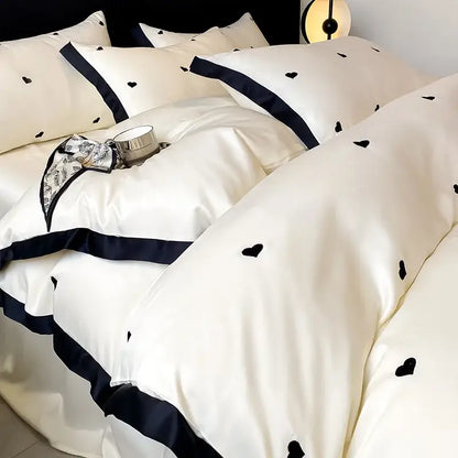 Luxury cream satin duvet cover set with black heart embroidery navy blue ruffled trim ice silk bedding sets decorbites ice silk