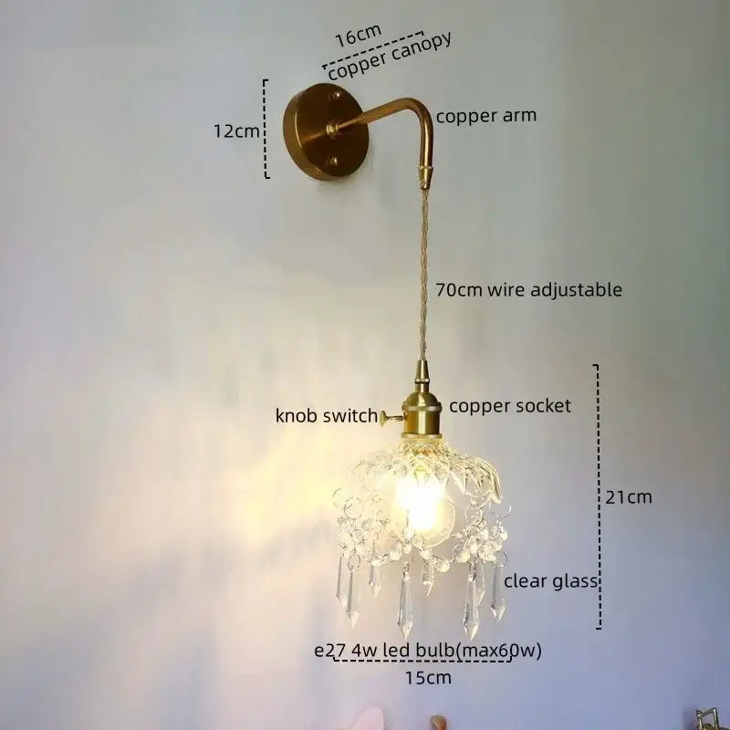 Luxury crystal copper led wall sconce with clear glass shade and dangling crystal droplets for bedroom lighting