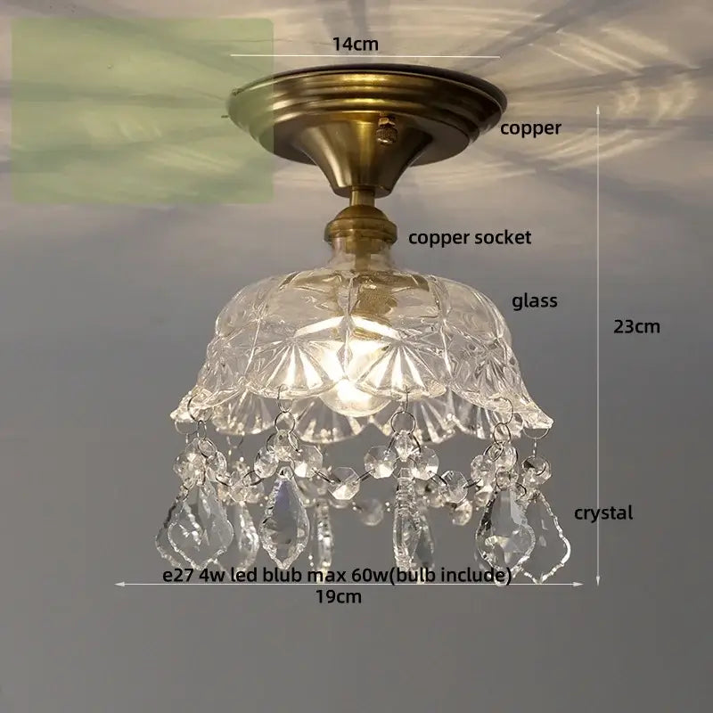 Antique brass-finished ceiling light with faceted glass shade and dangling crystal teardrops for crystal glass luxury decorbites decor
