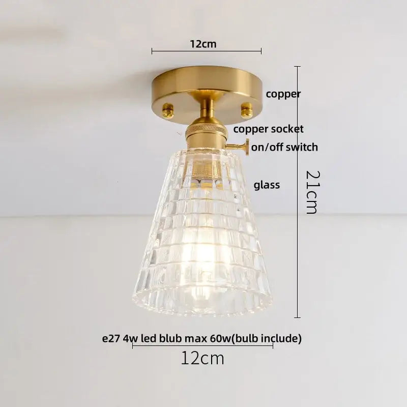 Luxury crystal glass ceiling light featuring a clear faceted pendant with brass copper finished mounting base decorbites crystal glass