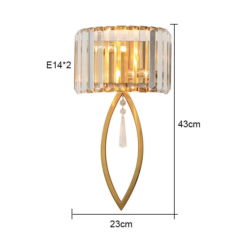 Luxury crystal gold wall lamp with gold-toned frame, cylindrical crystal shade, and hanging clear glass beads for decorbites wall lamp