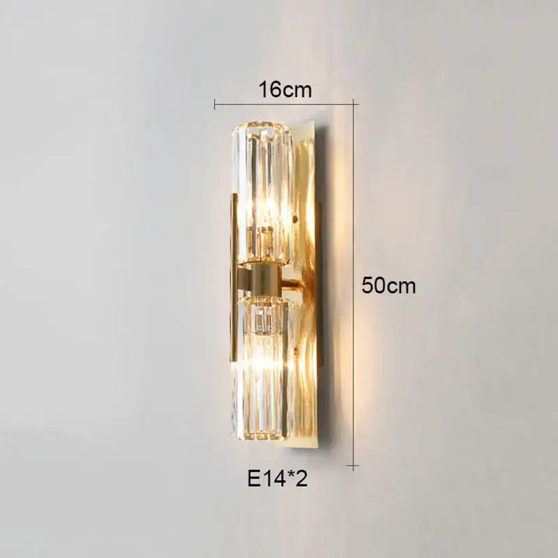 Luxury crystal gold wall lamp featuring gold-toned metallic frame with two vertical crystal glass shades for decorbites wall lamp