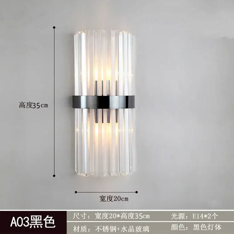 Black wall lamp with vertical crystal glass rods and sleek stainless steel band from decorbites crystal golden wall collection