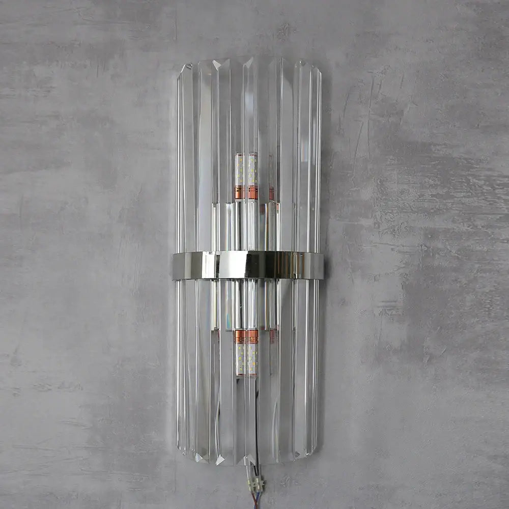 Luxury crystal golden wall lamp featuring a clear crystal glass sconce with a sleek chrome accent band for decorbites decor