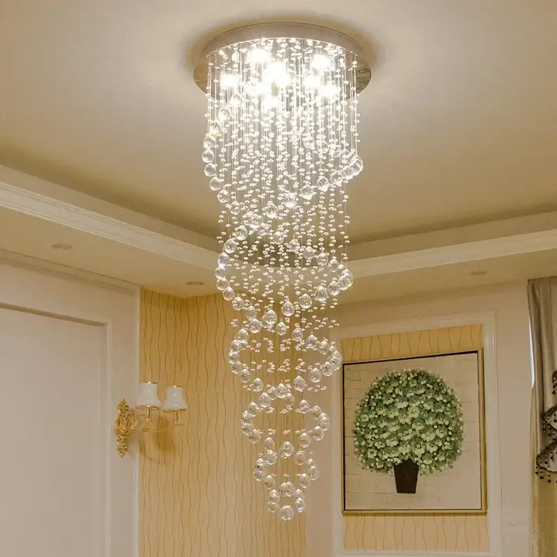 Luxury decorbites crystal staircase chandelier with cascading clear faceted beads and circular metallic base for bedroom lighting
